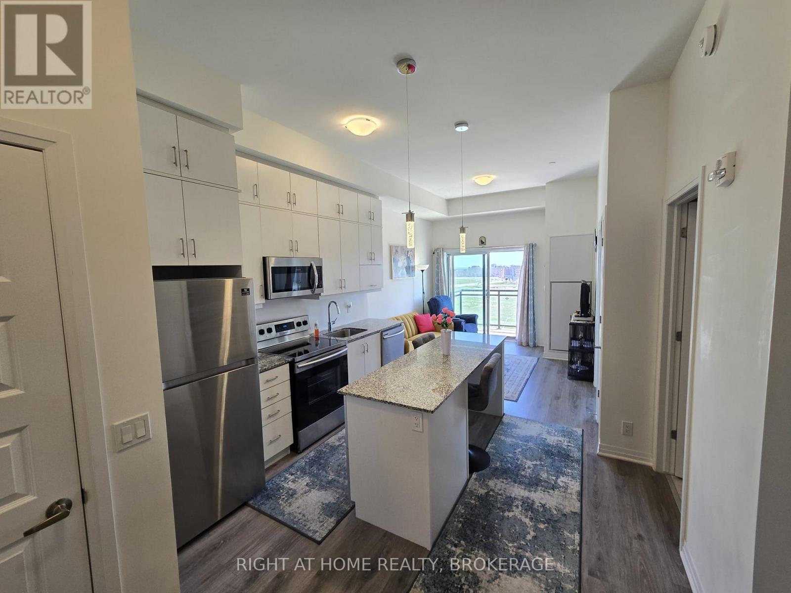 620 - 128 Grovewood Commons, Oakville (Go Glenorchy), Ontario  L6H 0X3 - Photo 1 - W12107064