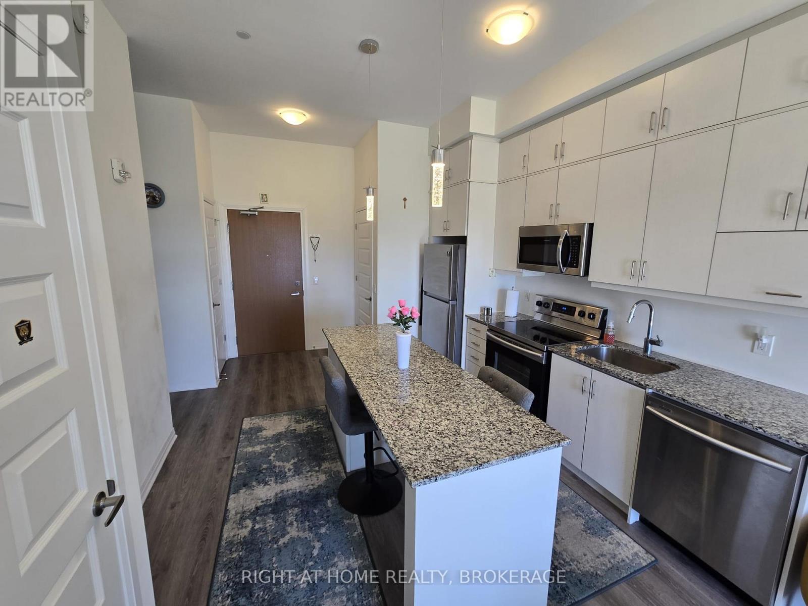 620 - 128 Grovewood Commons, Oakville (Go Glenorchy), Ontario  L6H 0X3 - Photo 2 - W12107064