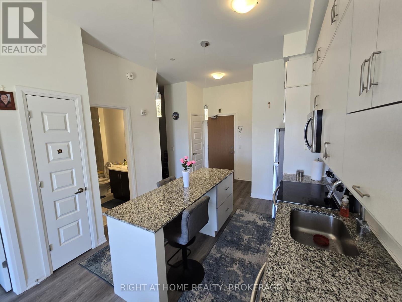 620 - 128 Grovewood Commons, Oakville (Go Glenorchy), Ontario  L6H 0X3 - Photo 3 - W12107064