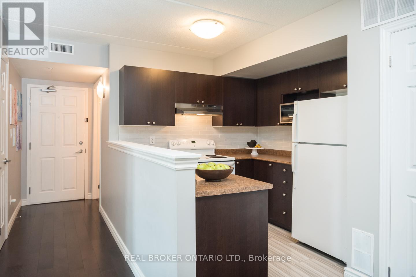 110 - 1479 Maple Avenue, Milton, Ontario  L9T 0B5 - Photo 3 - W12107251