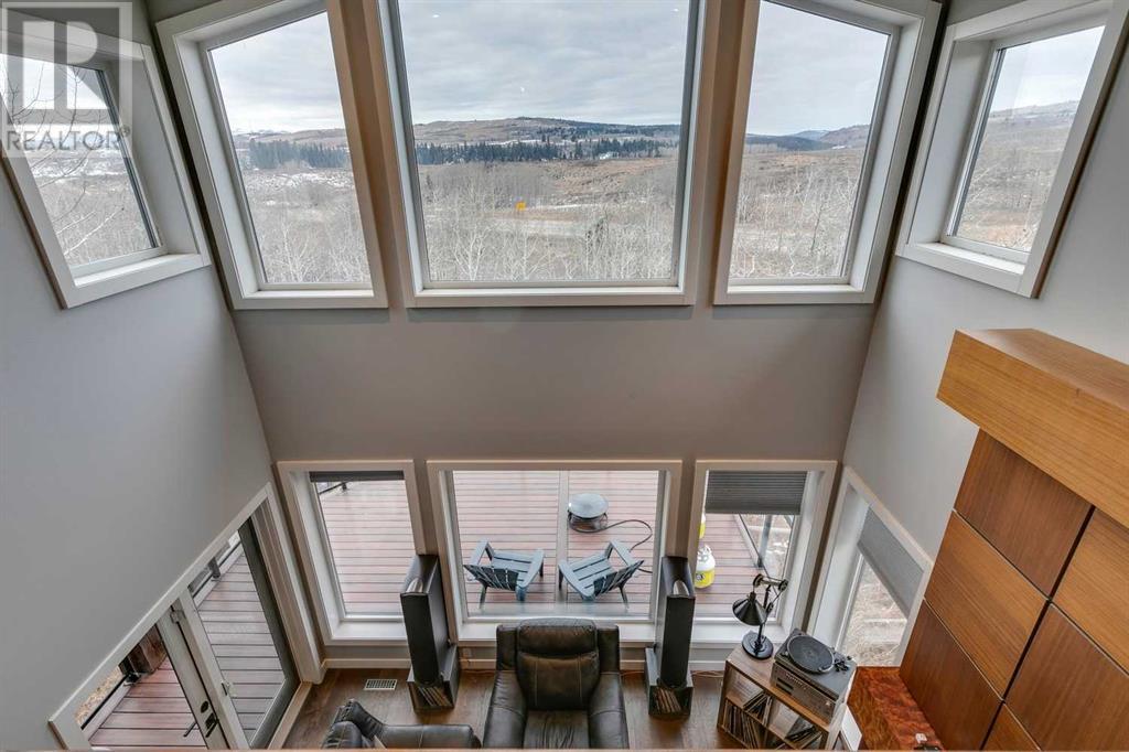 243 Cottageclub Crescent, Rural Rocky View County, Alberta  T4C 1B1 - Photo 16 - A2183591
