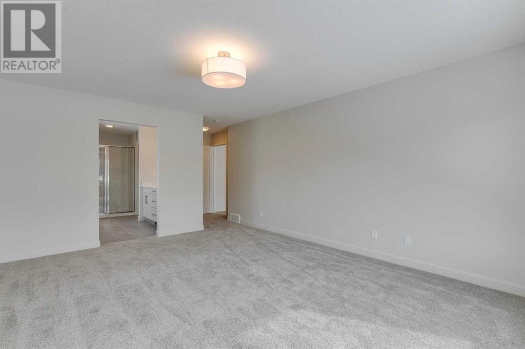 558 Rivercrest View, Cochrane, Alberta  T4C 2W9 - Photo 22 - A2188916