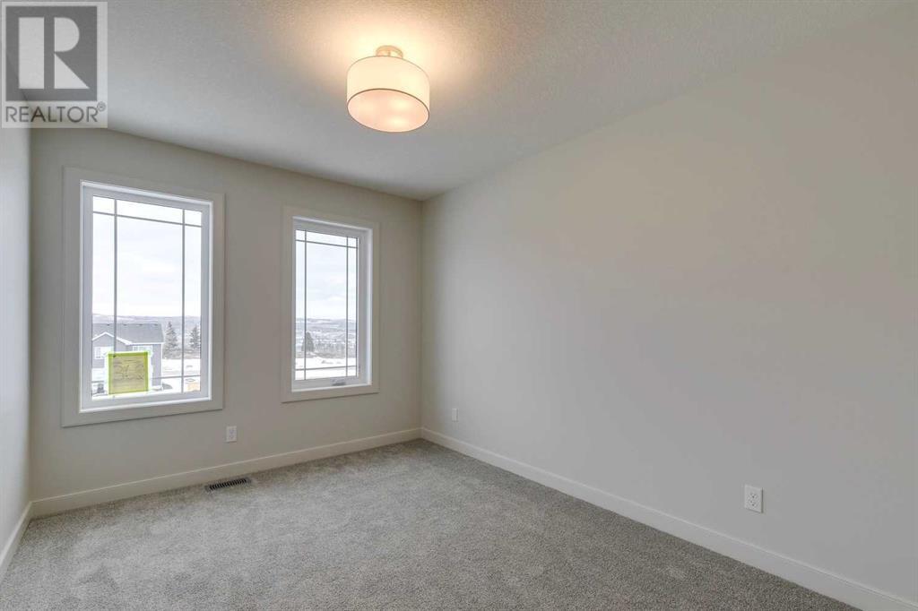 558 Rivercrest View, Cochrane, Alberta  T4C 2W9 - Photo 30 - A2188916