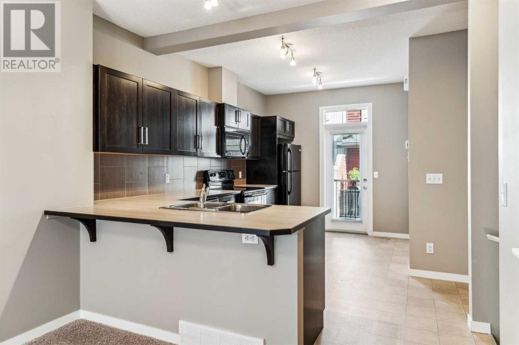236 New Brighton Row Se, Calgary, Alberta  T2Z 1B9 - Photo 6 - A2198975