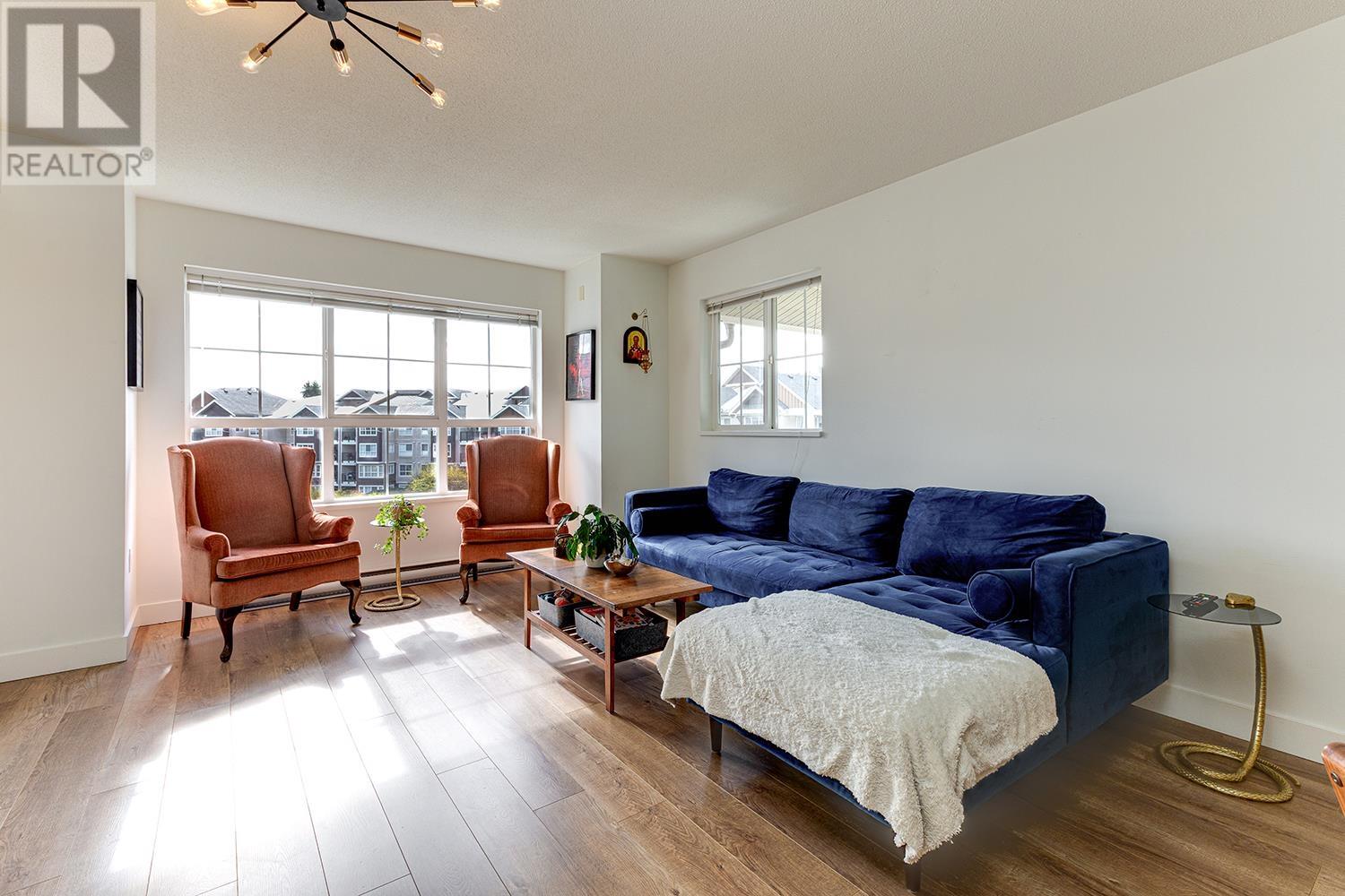 405 19673 Meadow Gardens Way, Pitt Meadows, British Columbia  V3Y 0A1 - Photo 5 - R2989087