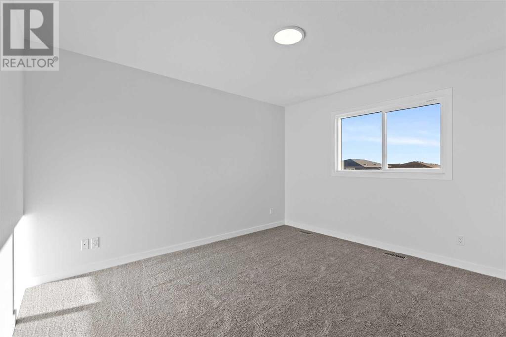 148 Lawson Lane Se, Airdrie, Alberta  T4A 3P4 - Photo 30 - A2199696