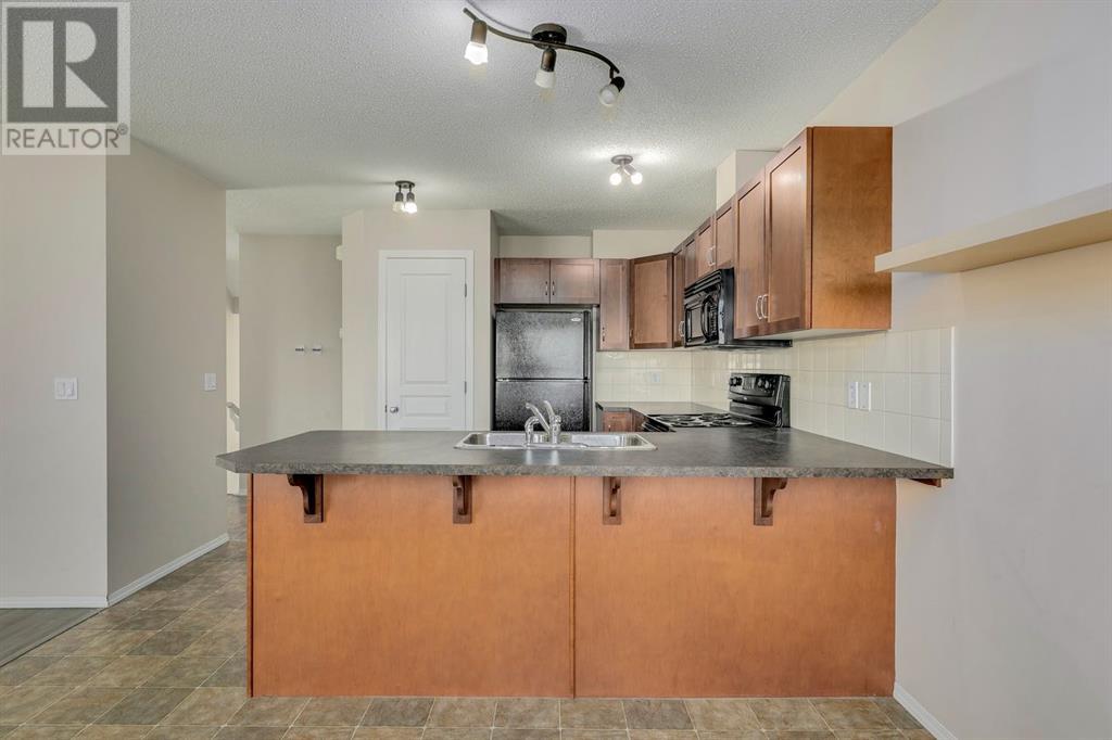 406, 800 Yankee Valley Boulevard Se, Airdrie, Alberta  T4A 2L1 - Photo 20 - A2214114