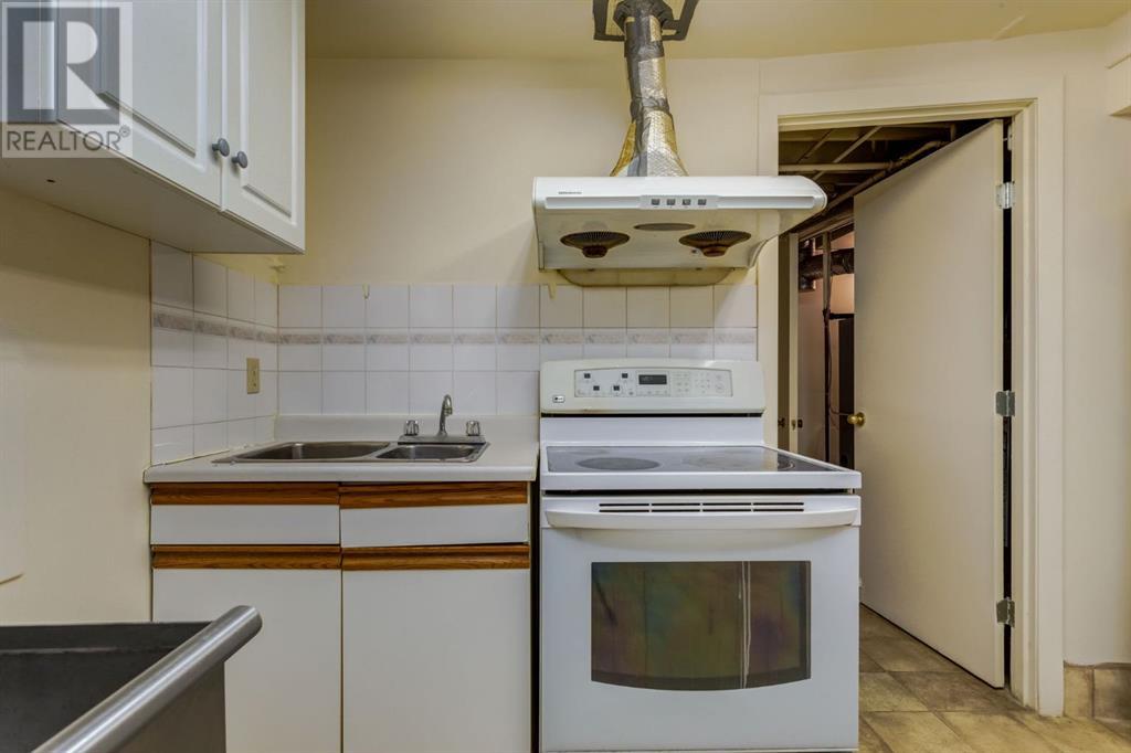 6119 Thornaby Way Nw, Calgary, Alberta  T2K 5K7 - Photo 21 - A2195691