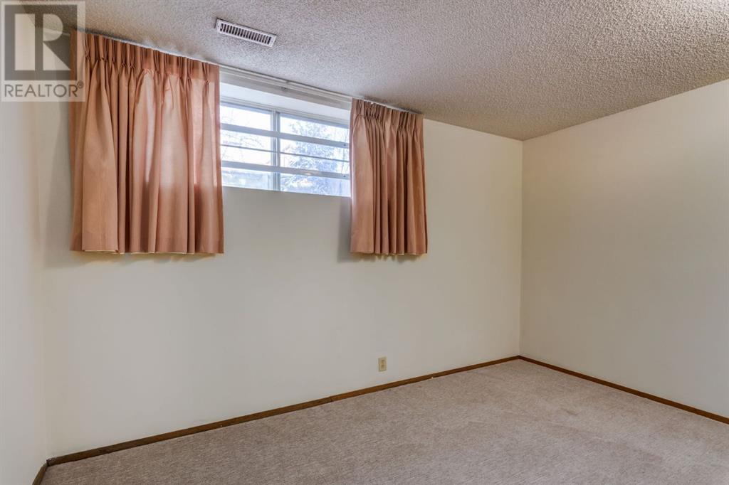 6119 Thornaby Way Nw, Calgary, Alberta  T2K 5K7 - Photo 23 - A2195691