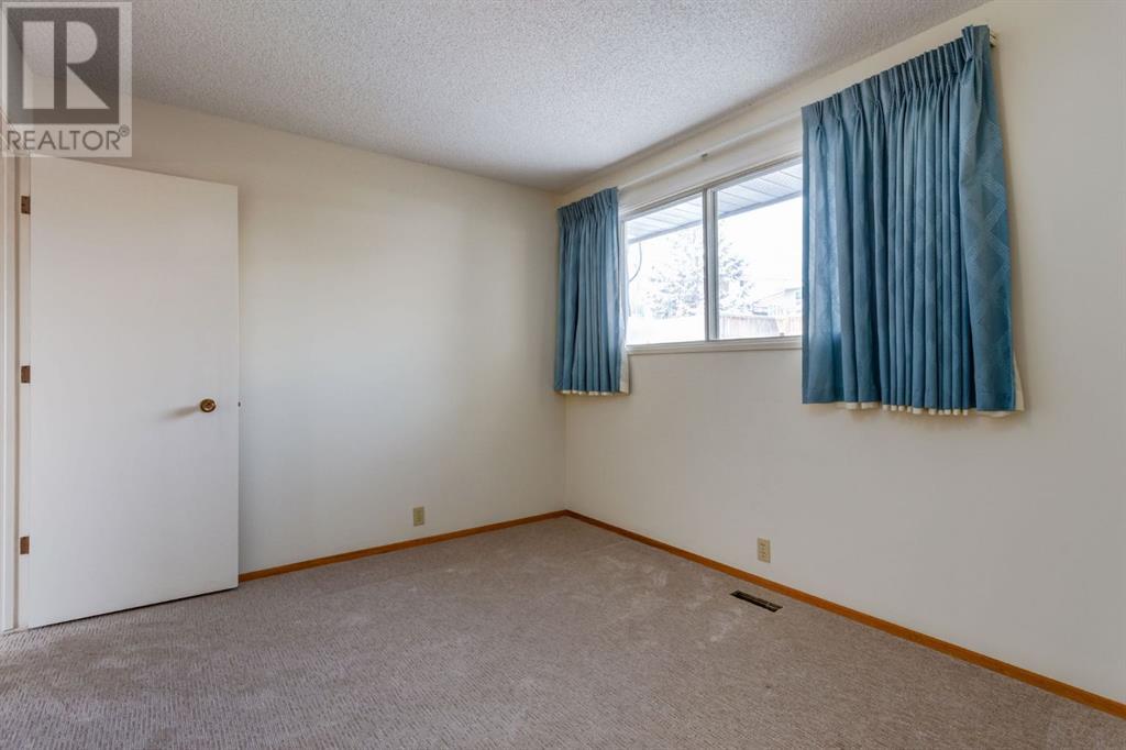 6119 Thornaby Way Nw, Calgary, Alberta  T2K 5K7 - Photo 12 - A2195691