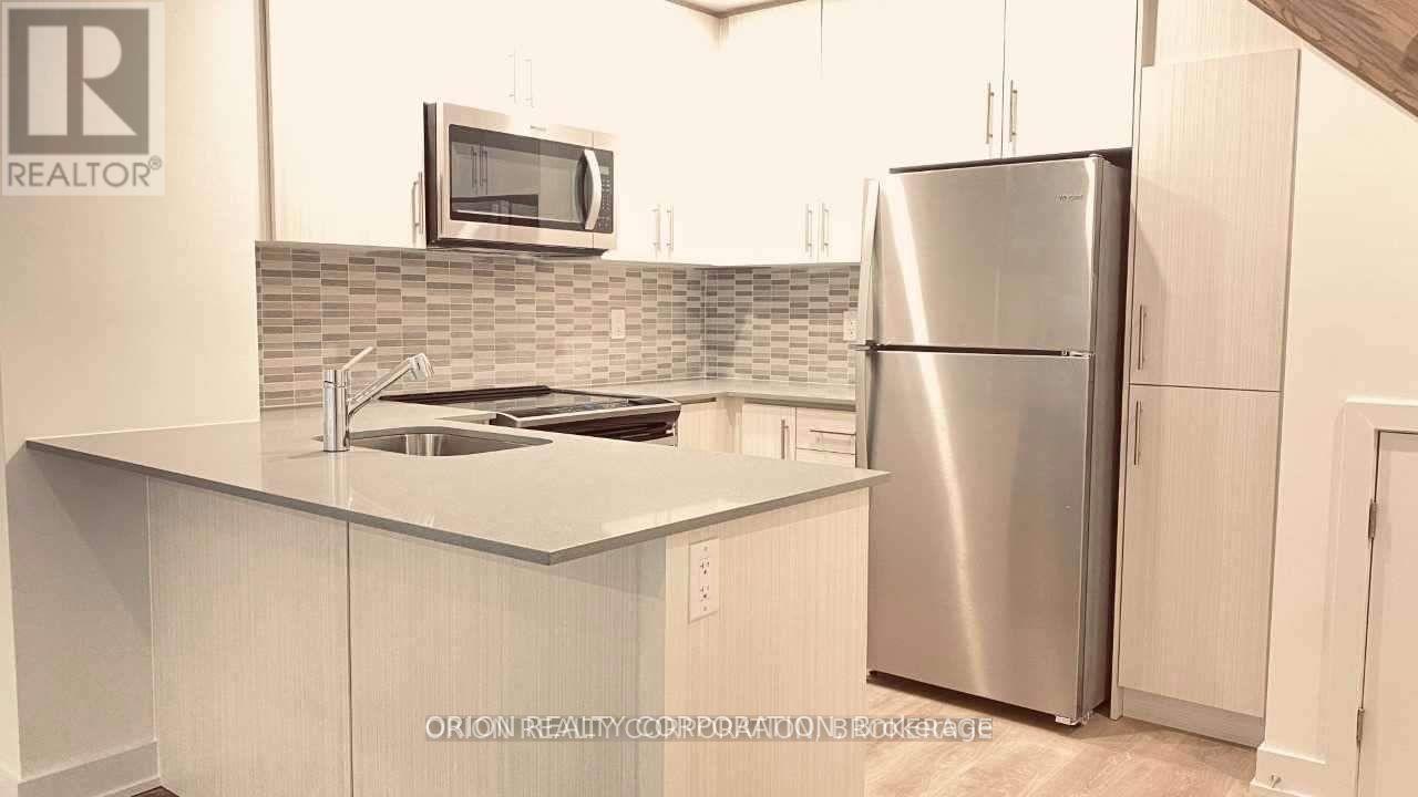 13 - 3482 Widdicombe Way, Mississauga, Ontario  L5L 0B8 - Photo 3 - W12110521