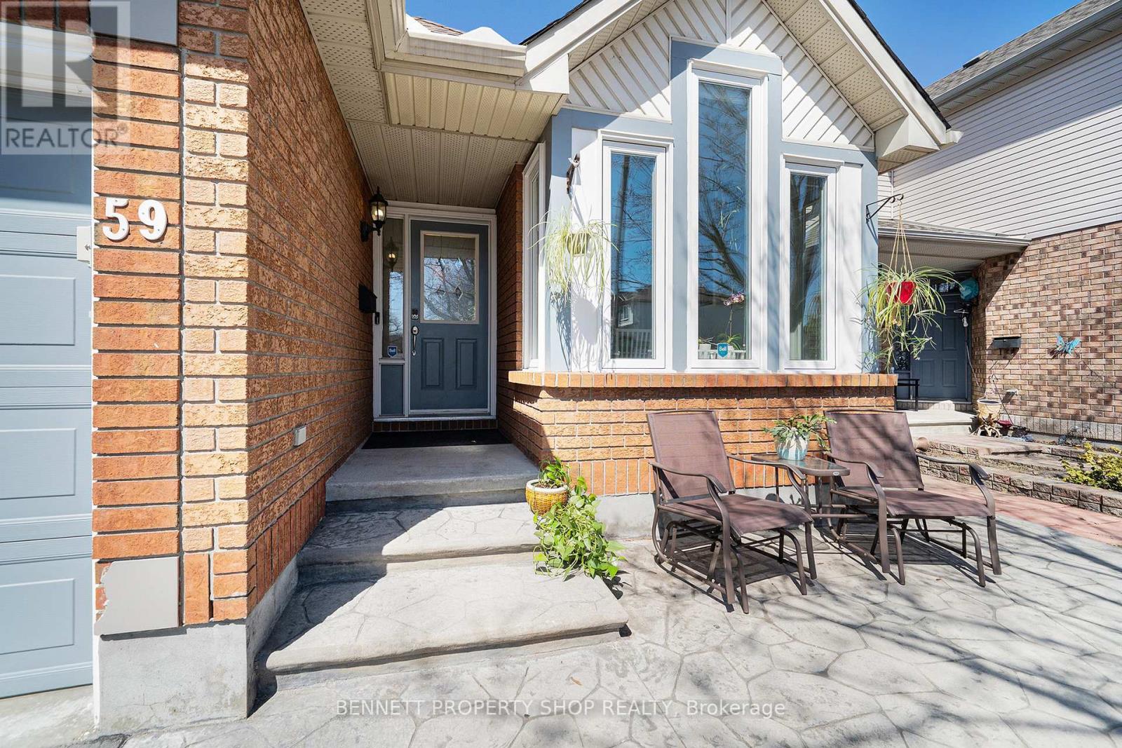 59 Queensbury Drive, Ottawa, Ontario  K2J 4L7 - Photo 2 - X12110804