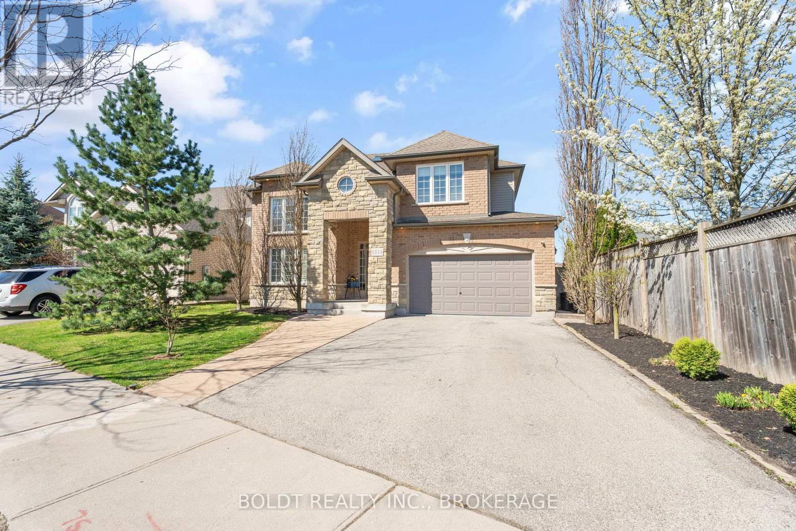Property at 8114 WINDSONG DRIVE image 1
