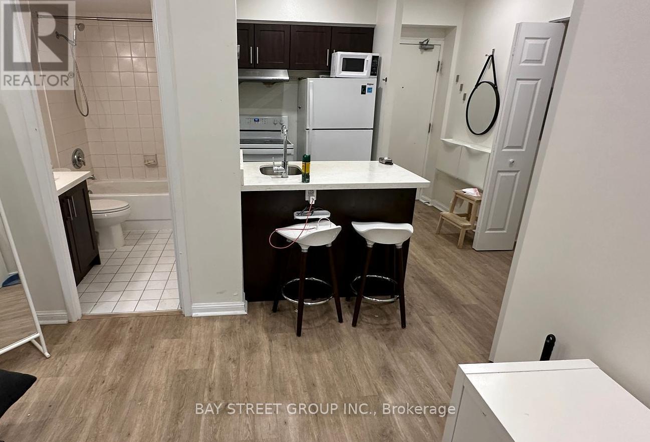 409 - 25 Grenville Street, Toronto, Ontario  M4Y 2X5 - Photo 1 - C12111719