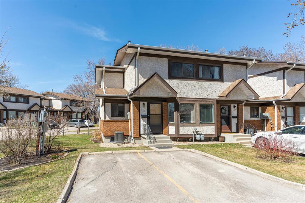 549 St Anne's Road Winnipeg, Manitoba 2E//Winnipeg/S/S Now! OTP TUESDAY NIGHT MAY 6th**OPEN HOUSE-- SATURDAY+SUNDAY MAY 3rd and 4th 2-4pm**Superb located corner unit at Tree Top Village!--This 2 Bedroom 2.5 Bath Fully Finished Townhouse condo is a great option for those looking to get into affordable living! 1100+square feet, galley kitchen w/white shaker cabinets, SS appliances, with good sunlight while cooking it up! Separate dining area, guest bathroom, open stair case with black iron railings, comfy living room and sliding doors to your lovely deck for backyard barbecues and Sunday lounging! Upstairs we have two huge bedrooms with exceeding closet space, good natural light, and a 4pce Tile surround bathroom! The LL has a great big rec/room or student bedroom!? (window does not meet egress) modern tiled 3pce bathroom, and a spacious ultility/laundry room w/tons of storage! TWO Parking spots infant!--Pristine grounds and location!--One bus to U of M or downtown, schools, shopping, and the Royalwood Forest+Trails! Surrounded by nature w/a private community feel--UPDATES INCLUDE: Newer Refrigerator, Central AC, Hot Water Tank, Professionally painted Interior April 2025+Deck painted PET FRIENDLY! QUICK POSSESSION AVAILABLE!--Call Your Realtor Now! (id:48254)