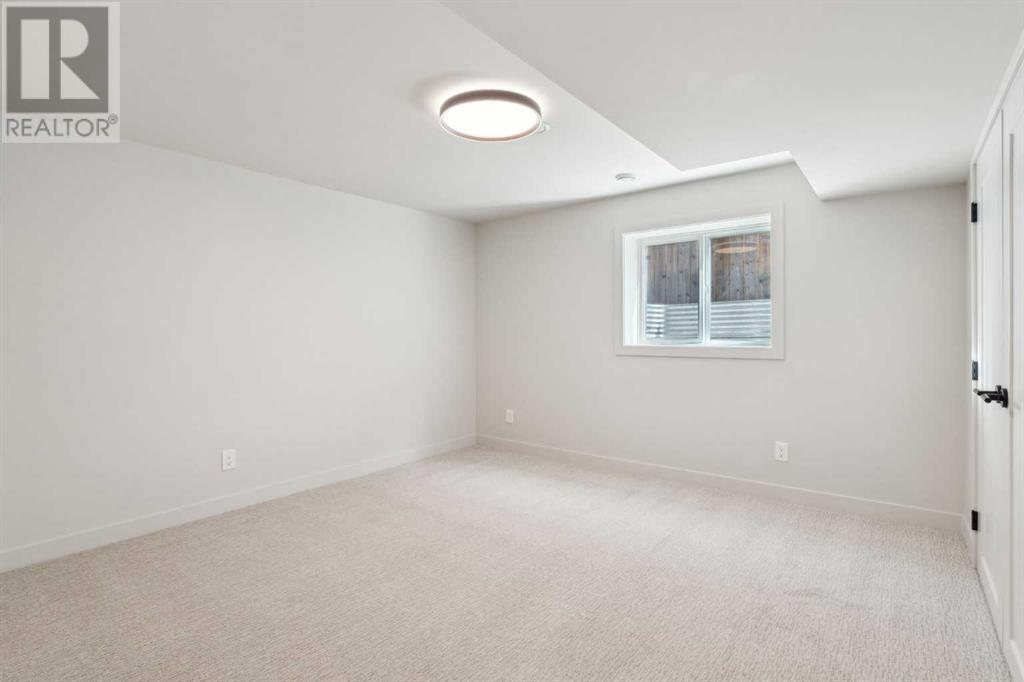 920 Canaveral Crescent Sw, Calgary, Alberta  T2W 1N5 - Photo 26 - A2211958
