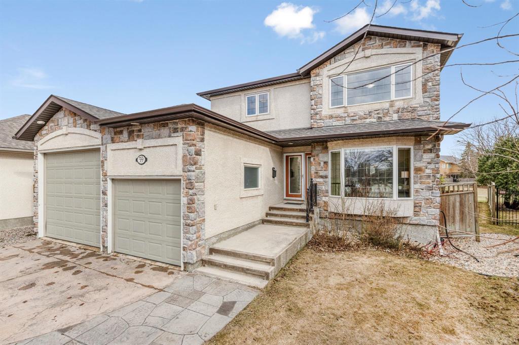 59 Winterhaven Drive Winnipeg, Manitoba 2F//Winnipeg/Offers Wed May7. Welcome to 59 Winterhaven Drive, a custom-built Arlt home offering space, style, & unbeatable backyard living in the heart of River Park South! This 2174 sqft 2-storey backs directly onto spectacular green space full of trails, playgrounds, & a peaceful lake. Inside, find 4 spacious bedrooms upstairs plus a fully finished in-floor heated basement w/5th bedroom, rec room, & workshop. Main floor highlights include a bright open kitchen w/gas stove & hidden-panel dishwasher, beautiful hardwood floors, & cozy gas fireplace in family room. Huge primary ensuite impresses w/jetted tub, 4 walk-in shower, & ceiling speakers for luxury & comfort! The basement offers heated floors, a colourful art room/bedroom, full bathroom, & your own private viewing lounge, perfect for game nights. Triple tandem garage features WiFi-controlled doors & floor heat in rear wash bay. Tandem side of garage has 10 x12' door to accommodate larger toys . Outside, enjoy south-facing Trex composite deck w/natural gas BBQ, perfect for summer living! If you're dreaming of a home w/massive green space backdrop, room for your family to grow, & smart updates already in place, this is it. Welcome home to 59 Winterhaven! (id:48254)