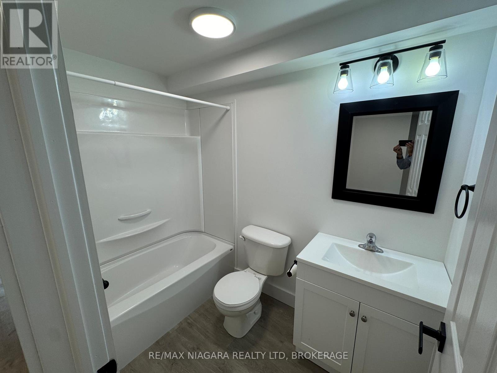 2 Lower - 8196 Mcleod Road, Niagara Falls, Ontario  L2H 3N3 - Photo 7 - X12015369