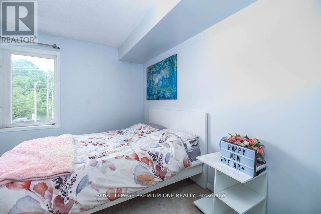 90 - 65 Turntable Crescent, Toronto, Ontario  M6H 4K8 - Photo 20 - W12112462