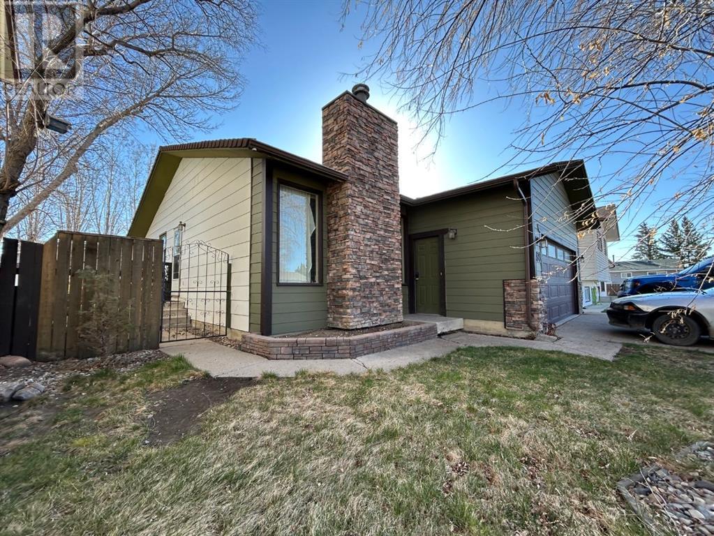 80 Cambridge Road W, Lethbridge, Alberta  T1K 4V9 - Photo 1 - A2212254
