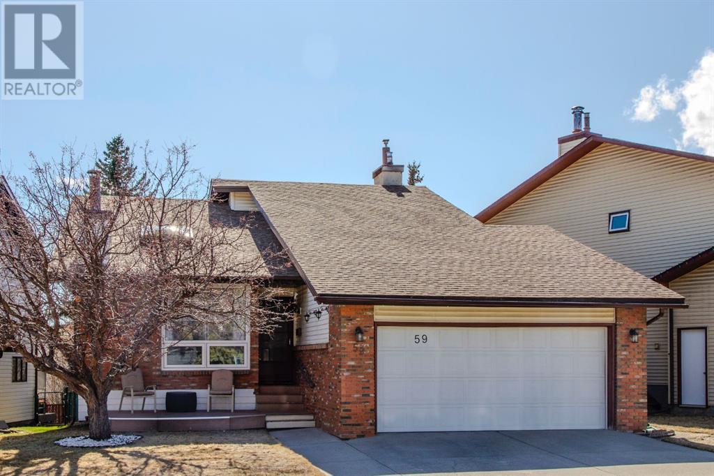 Property at 59 Ranchridge Crescent NW image 1
