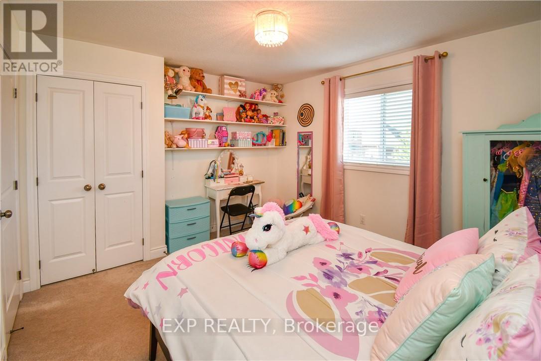 452 Greenwood Drive, Essa, Ontario  L0M 1B6 - Photo 18 - N12113461