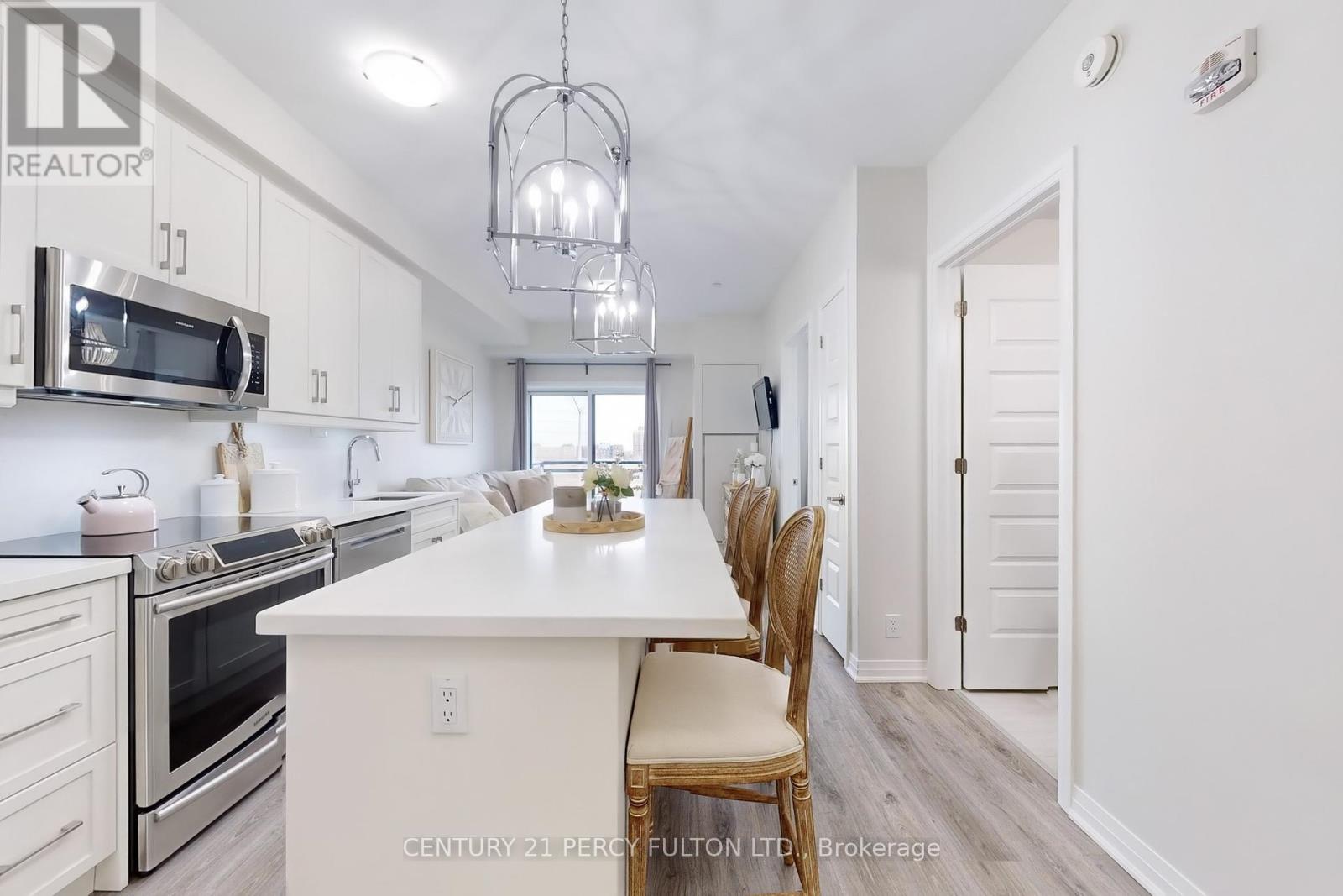 320 - 128 Grovewood Common, Oakville, Ontario  L6H 0X3 - Photo 18 - W12100845