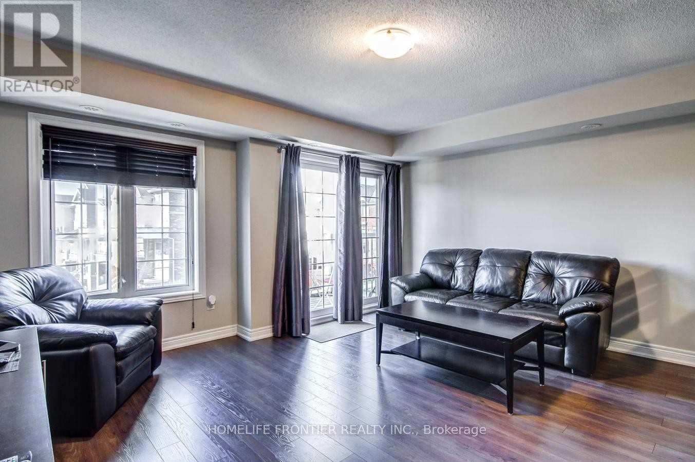 Property at 6 - 137 ISAAC DEVINS BOULEVARD image 4