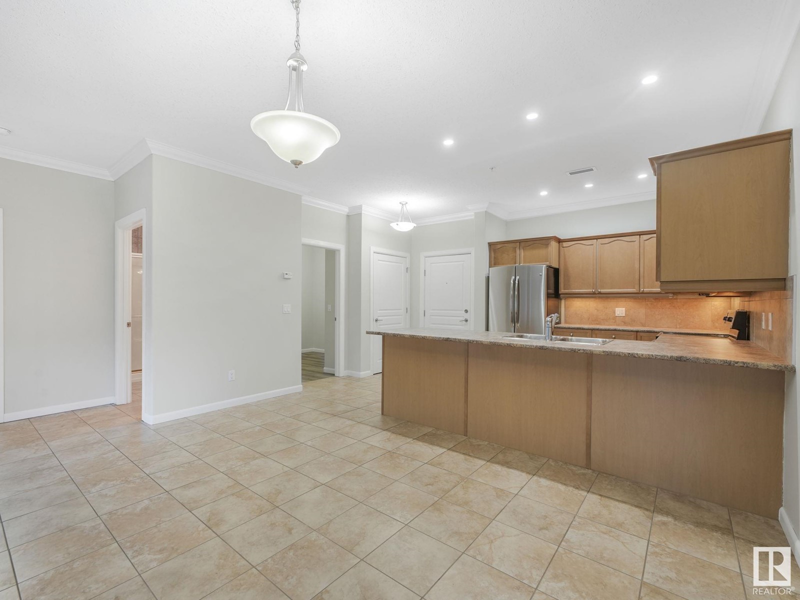 Property at #116 160 MAGRATH RD NW image 5