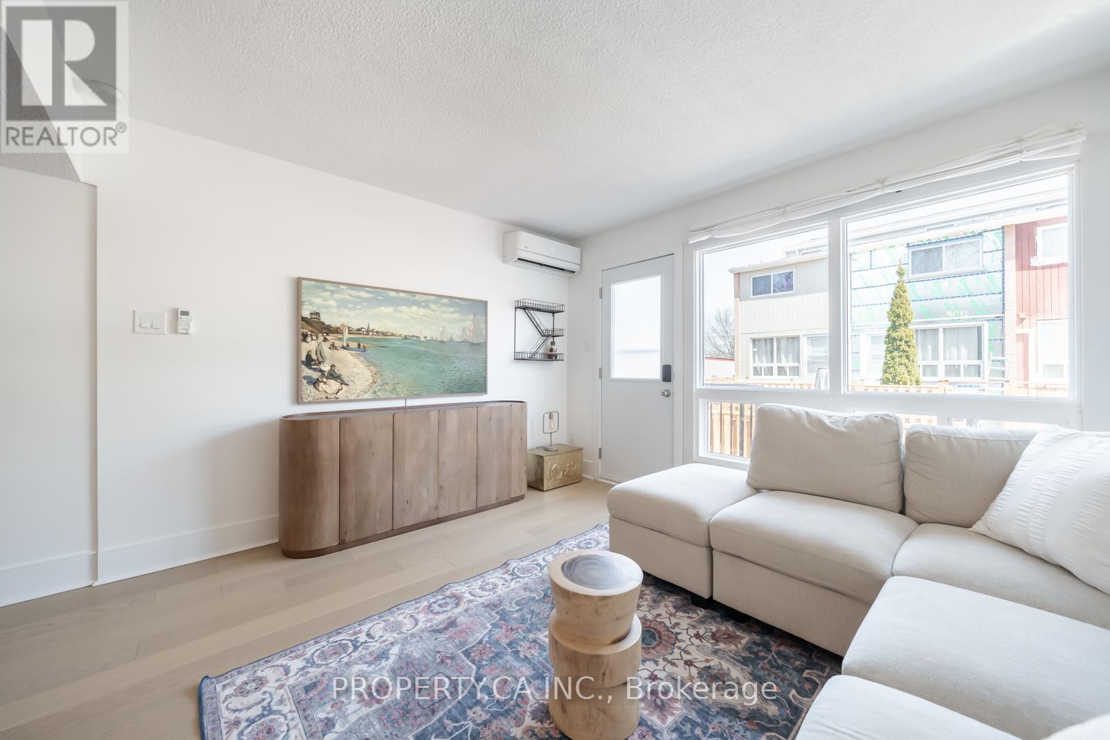 Property at 30 - 1209 QUEEN STREET E image 2