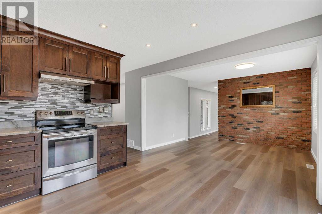 10636 Oakmoor Way Sw, Calgary, Alberta  T2W 2H8 - Photo 9 - A2201303