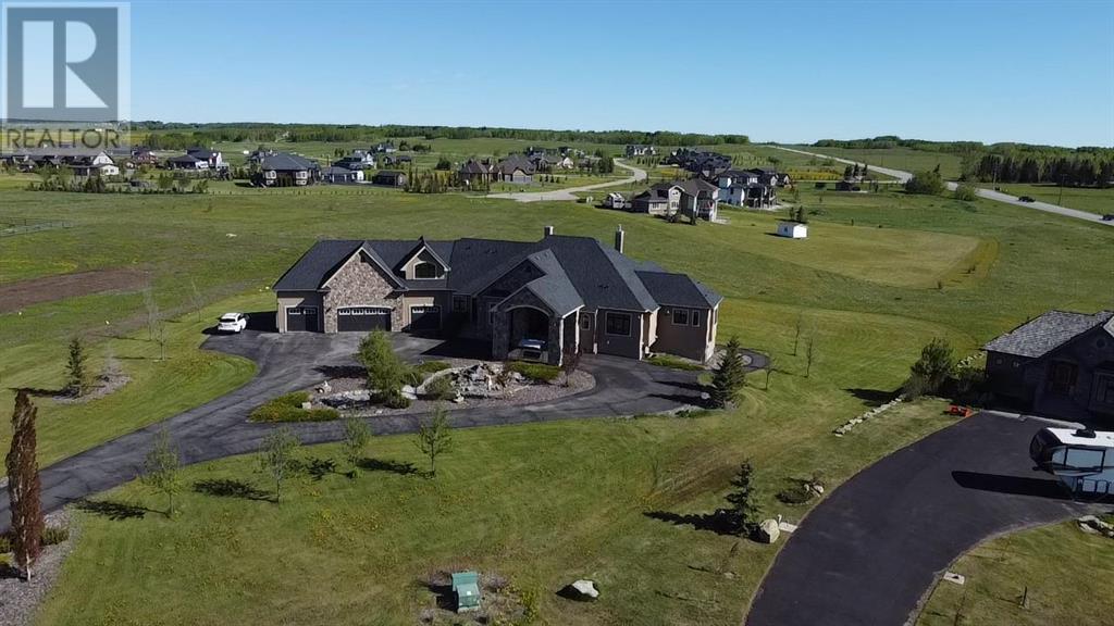 124 Grizzly Rise, Rural Rocky View County, Alberta  T4C 0B5 - Photo 1 - A2211387