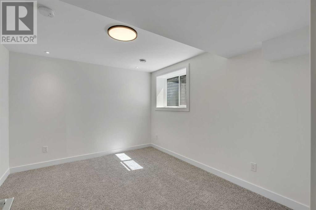10704 Oakfield Drive Sw, Calgary, Alberta  T2W 2C9 - Photo 28 - A2215504