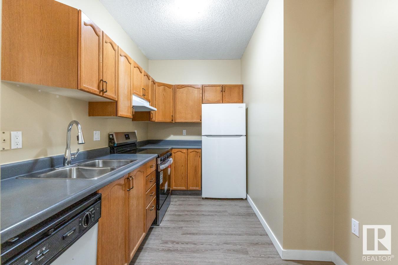 Property at #216 15499 CASTLE DOWNS RD NW image 4
