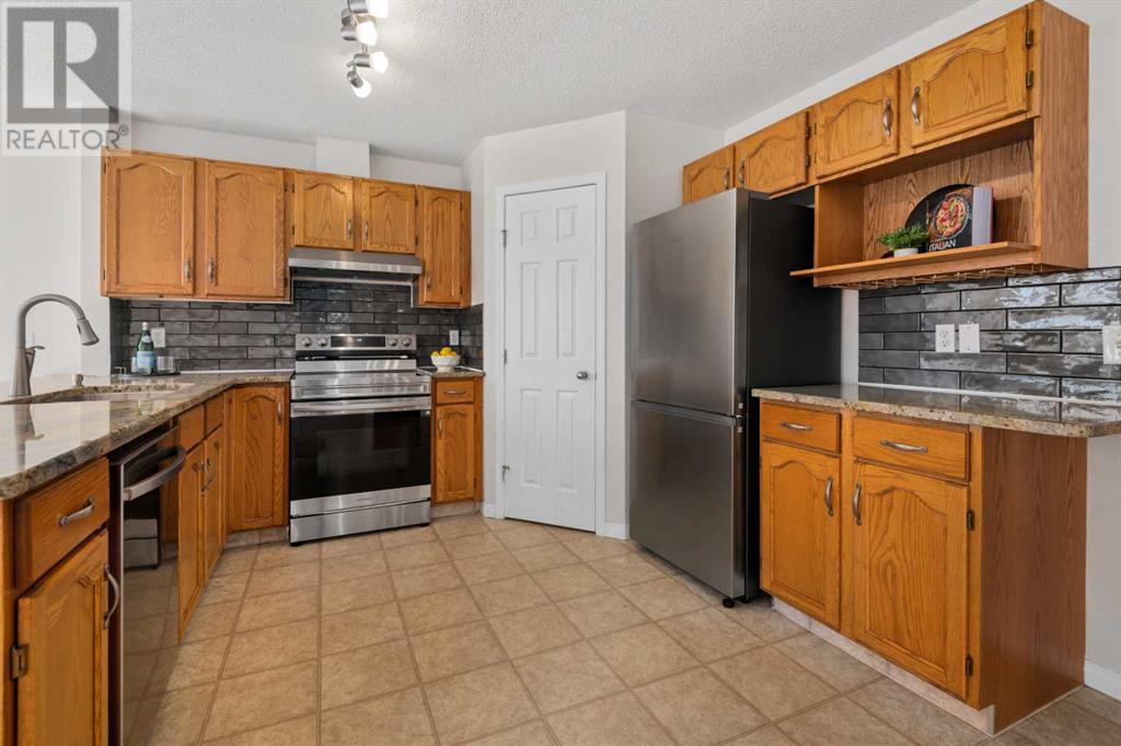 108 Hidden Creek Rise Nw, Calgary, Alberta  T3A 6L5 - Photo 3 - A2209122