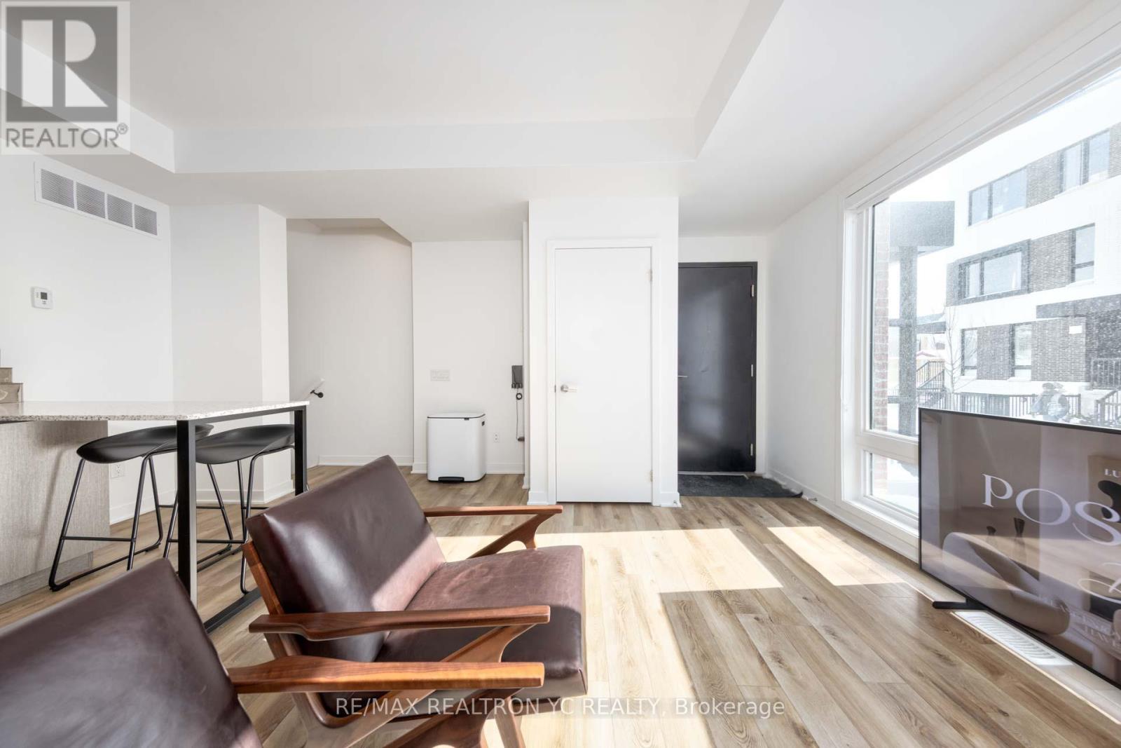 6 - 40 Ed Clark Gardens Boulevard, Toronto, Ontario  M6N 0B5 - Photo 2 - W12116093