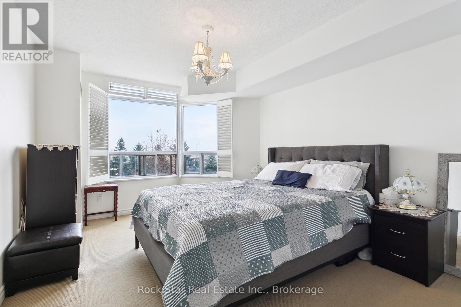 408 - 35 Kingsbridge Garden Circle, Mississauga, Ontario  L5R 3Z5 - Photo 18 - W12116664