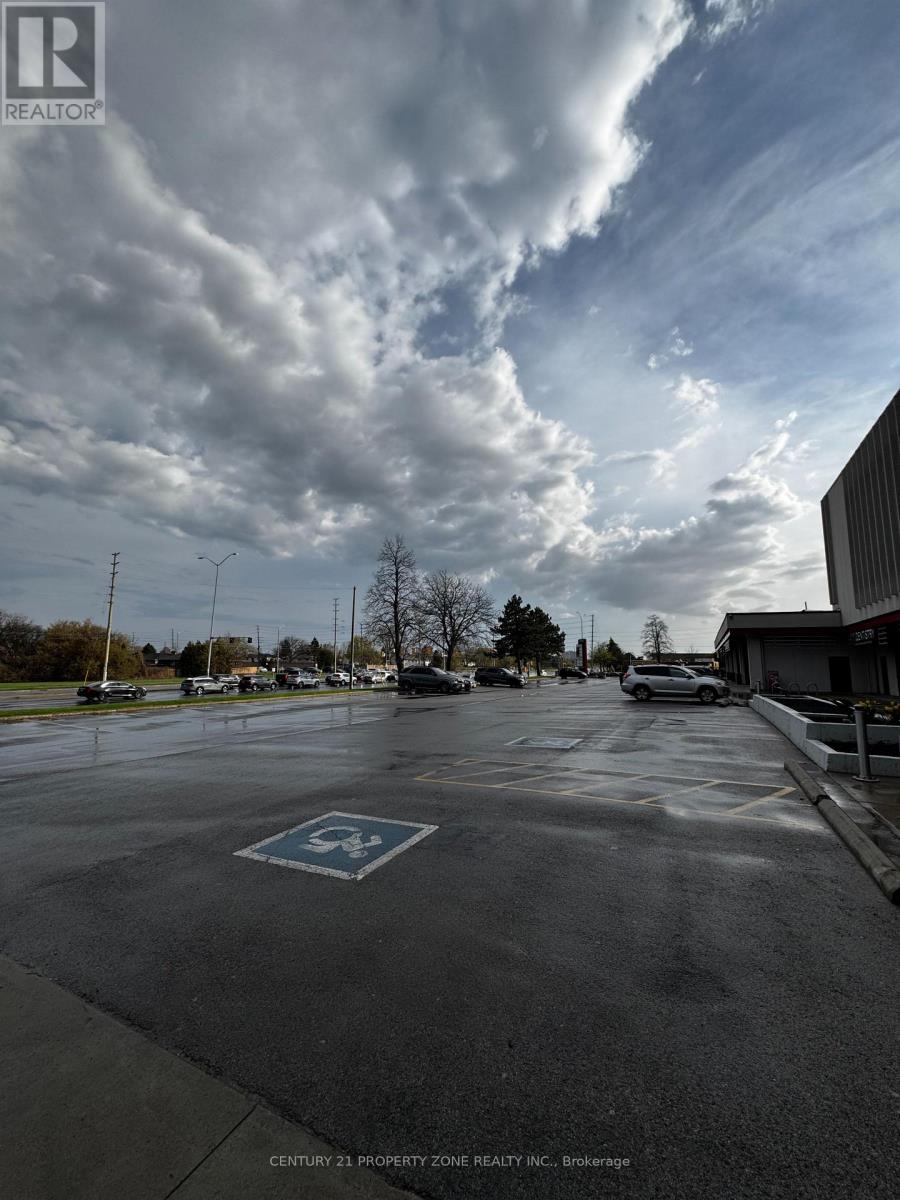 207 - 755 Queens Way E, Mississauga, Ontario  L4Y 4C5 - Photo 2 - W12114195