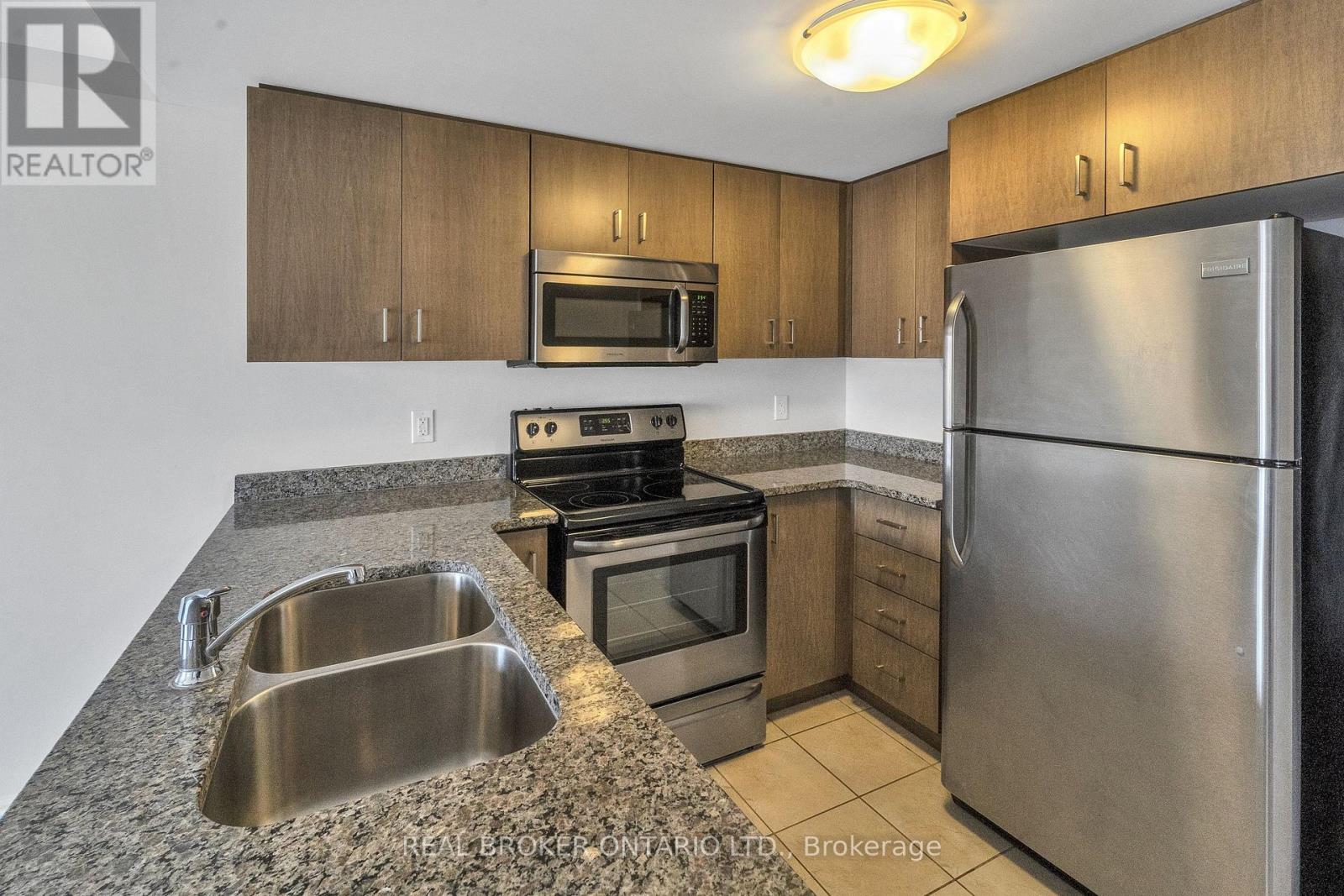 210 - 155 Commonwealth Street, Kitchener, Ontario  N2E 0G5 - Photo 4 - X12117328