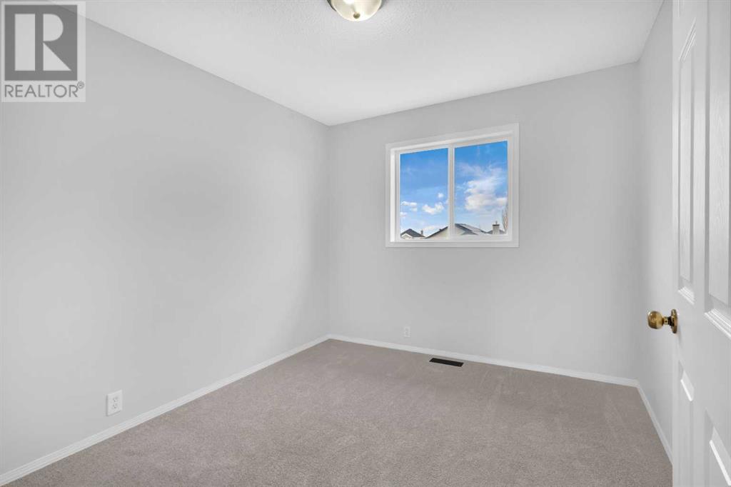 1095 Bridlemeadows Manor Sw, Calgary, Alberta  T2Y 4L1 - Photo 14 - A2216814