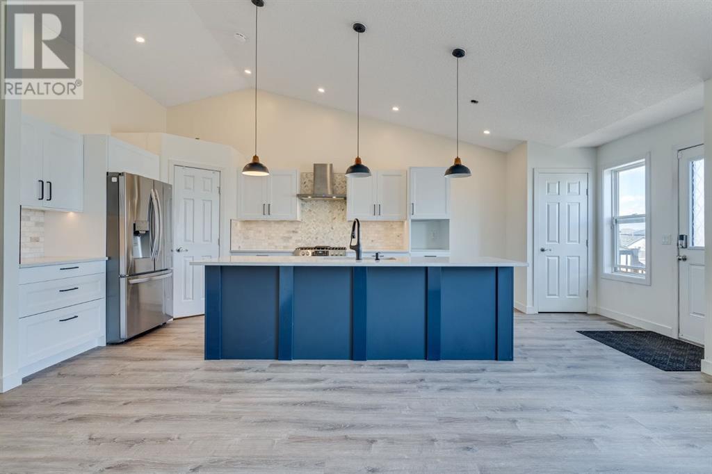 48 Cimarron Grove Way, Okotoks, Alberta  T1S 2L9 - Photo 6 - A2215933
