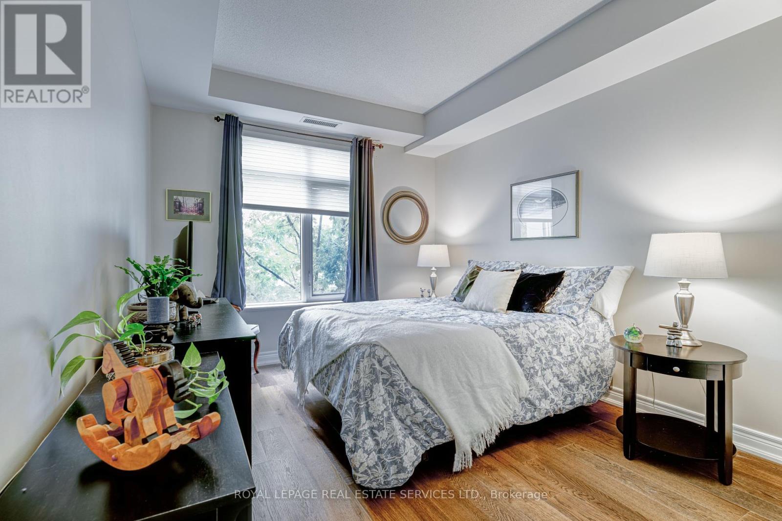 203 - 10 Old Mill Trail, Toronto, Ontario  M8X 2Y9 - Photo 14 - W12117802