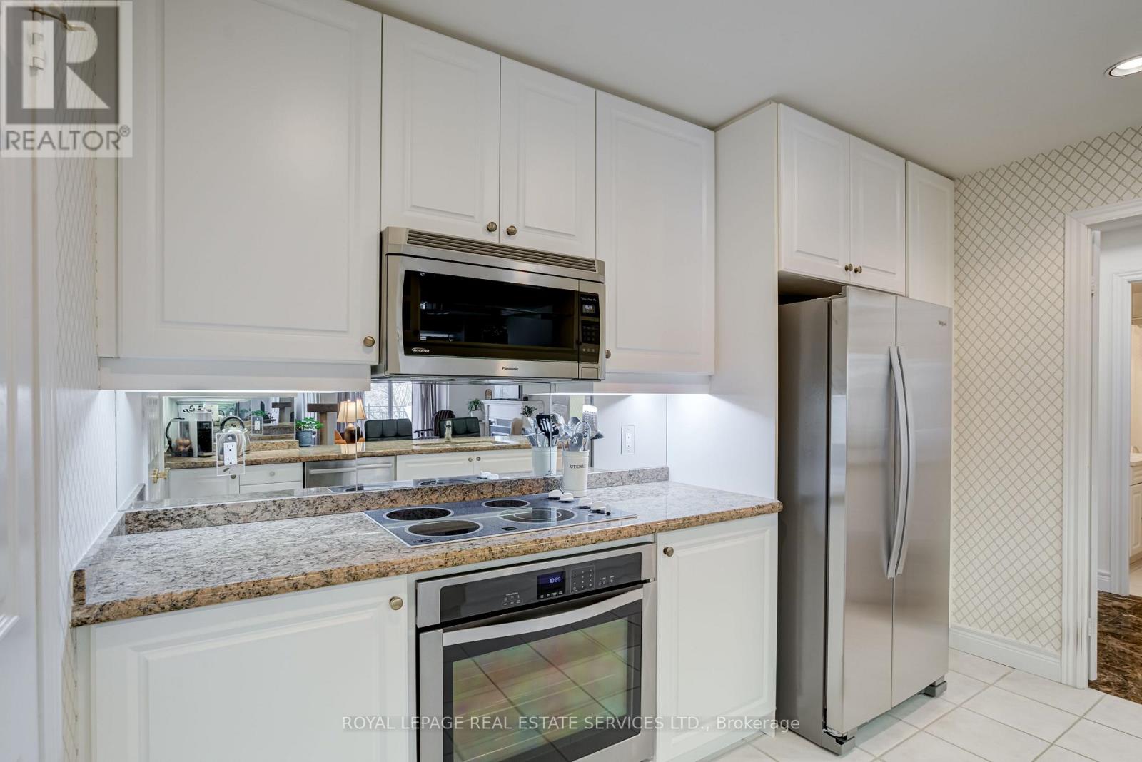 203 - 10 Old Mill Trail, Toronto, Ontario  M8X 2Y9 - Photo 6 - W12117802
