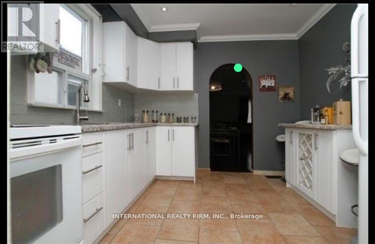 Main Floor - 210 Belgravia Avenue W, Toronto, Ontario  M6E 2M8 - Photo 3 - W12117904