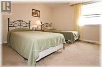 Main Floor - 210 Belgravia Avenue W, Toronto, Ontario  M6E 2M8 - Photo 5 - W12117904