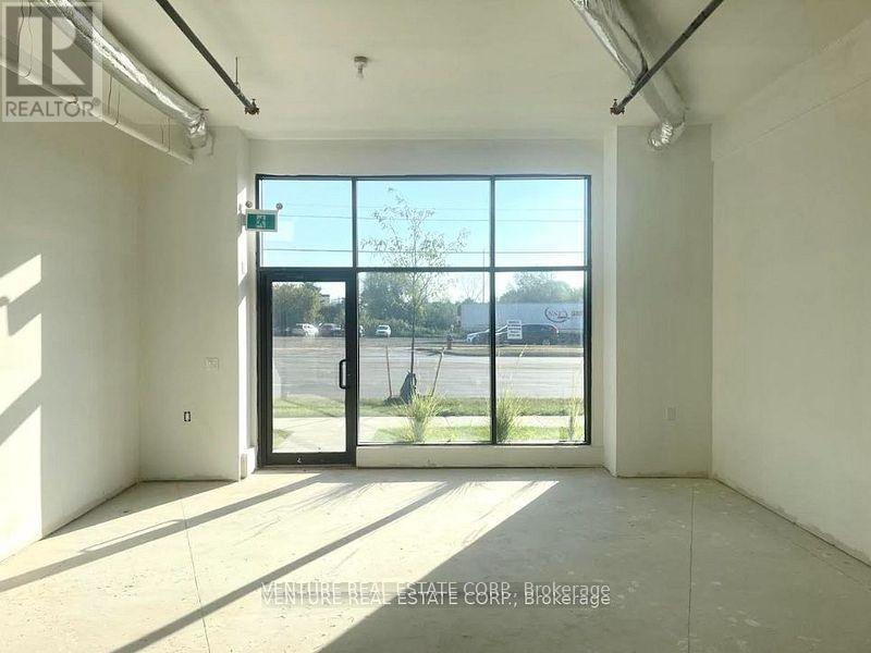 7 - 200 Dissette Street, Bradford West Gwillimbury, Ontario  L3Z 3G8 - Photo 2 - N12118633