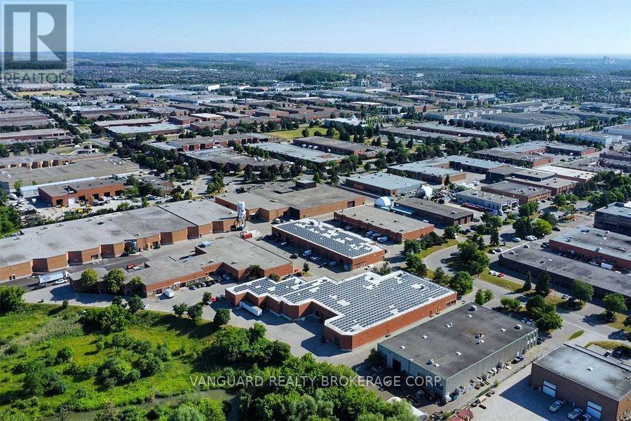 12-13 - 140 Bradwick Drive, Vaughan (Concord), Ontario  L4K 1K8 - Photo 1 - N12118993