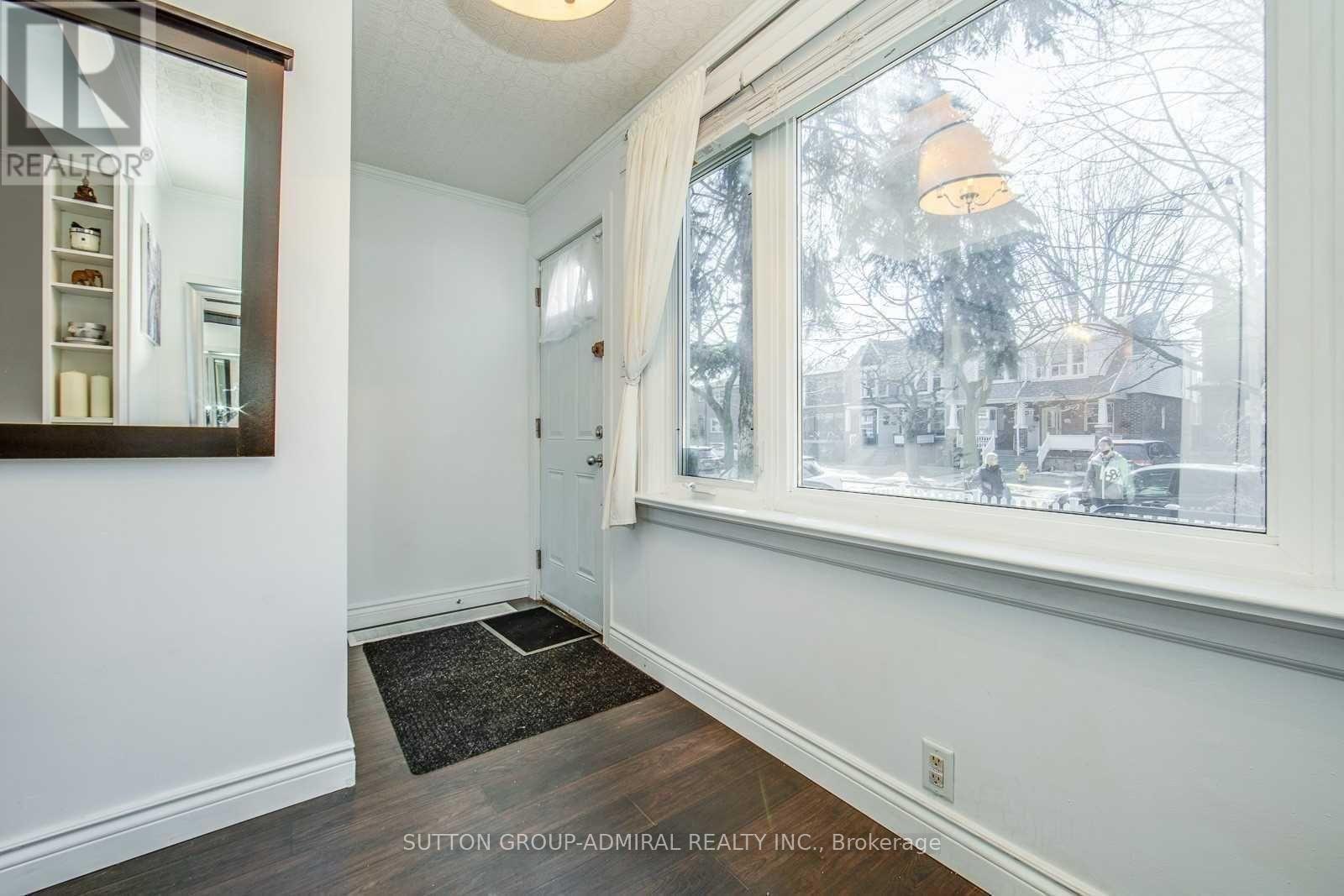 53 Rhodes Avenue, Toronto, Ontario  M4L 2Z8 - Photo 7 - E12118366