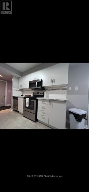 104 - 54 Sidney Belsey Crescent Sw, Toronto, Ontario  M6M 5J1 - Photo 4 - W12106368