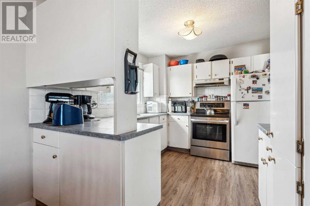 7216 Silvermead Road Nw, Calgary, Alberta  T3B 3V2 - Photo 6 - A2210204